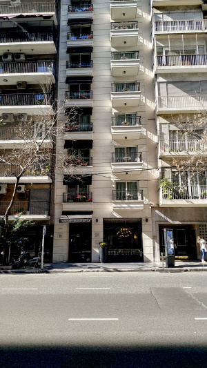 An exterior view of the hotel from the sidewalk.