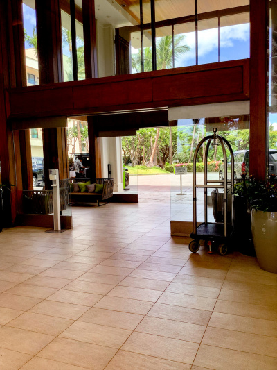 The hotel exit is through 2 sets of sliding glass doors. There is seating between the doors.