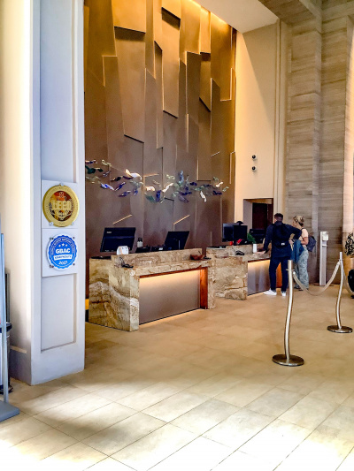 The hotel reception area is spacious and step-free. There are high and low check-in counters.