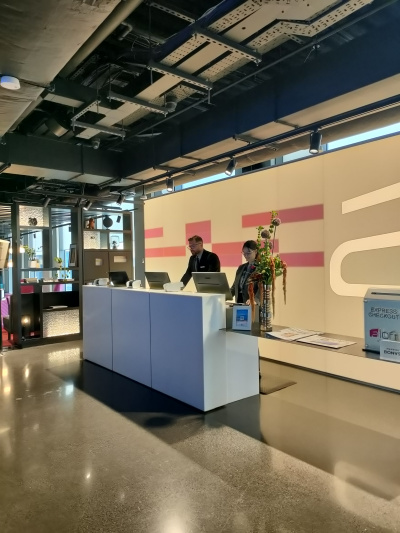 The reception desk is in a step-free area. There is a lowered check-in section of the desk.