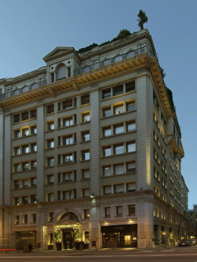 An exterior view of the hotel from the sidewalk.