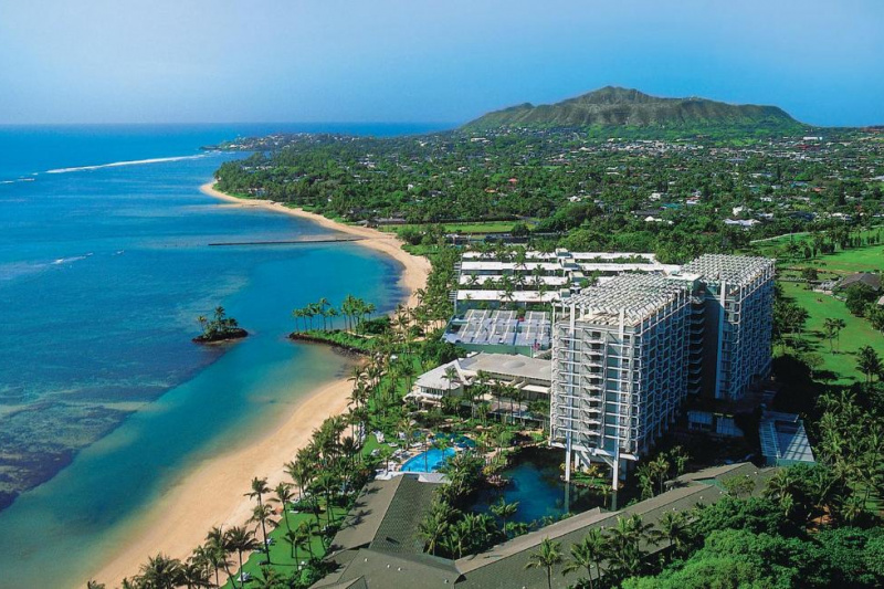 Aerial view of the hotel and resort and surrounding landscape.