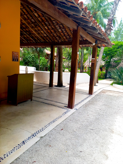The outside area is spacious and step-free. There is a pathway leading from the garden.