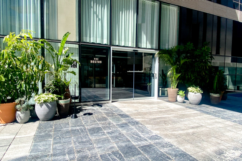 There is step-free access to the hotel from the paved sidewalk through 2 glass sliding doors.