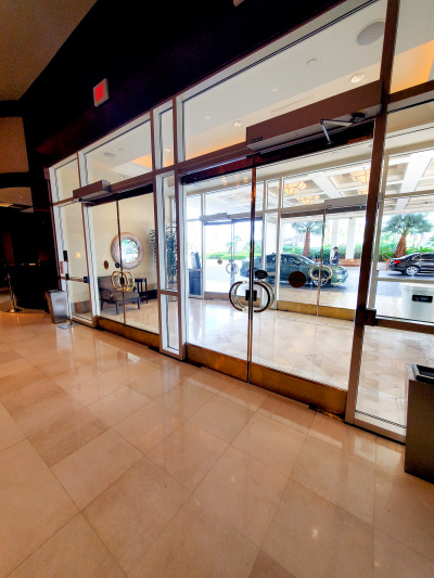 There is step-free access to the hotel from the covered drop-off zone through 2 sets of glass doors.
