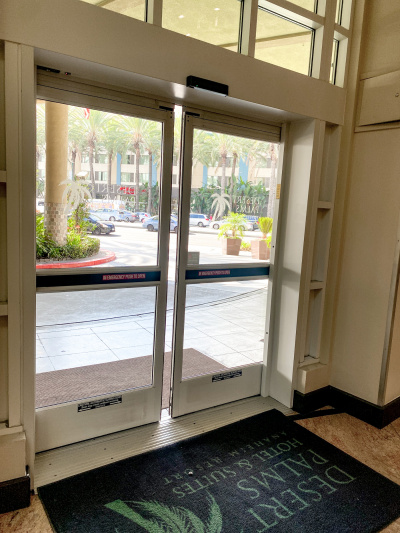 There are 2 automatic glass doors that lead to the drive through entrance. There are doormats on both sides of the doors.