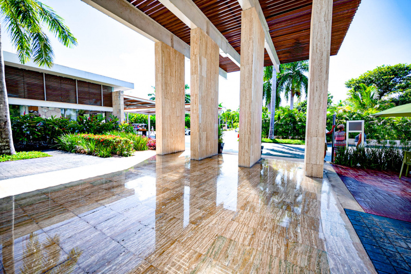 Outside the hotel is a spacious, step-free area leading to the road.