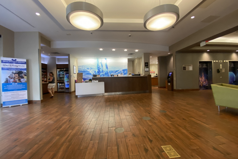 The spacious, step-free reception area has a high check-in desk with a lowered counter area.