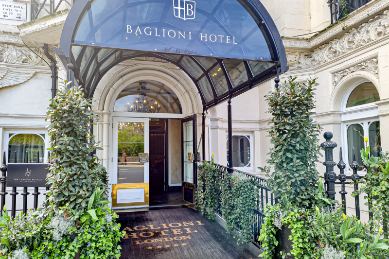 Access to the hotel is along a short, covered pathway.