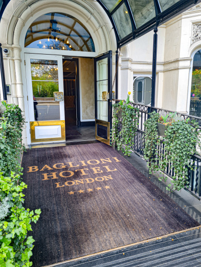 Access to the hotel is along a short, covered pathway.