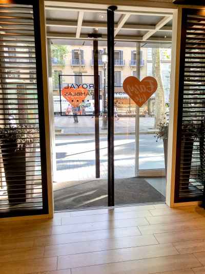 There are 2 sets of automatic glass doors leading from the lobby to the the sidewalk.
