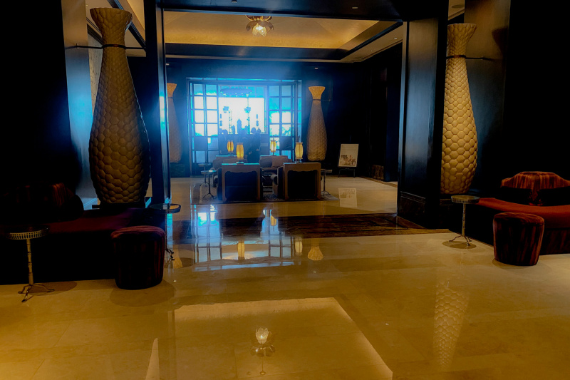 The spacious lobby has 2 sets of chairs placed in front of each other. The area is very spacious and is step-free.