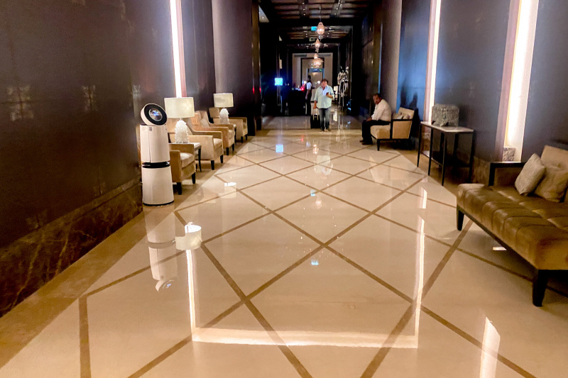 The spacious, step-free corridor is lined with sofas and armchairs.
