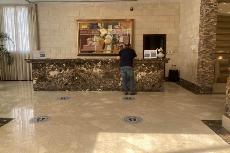 The spacious, step-free reception area has a high check-in desk.