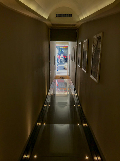 The hotel entrance is through a long narrow corridor. There are no handrails.