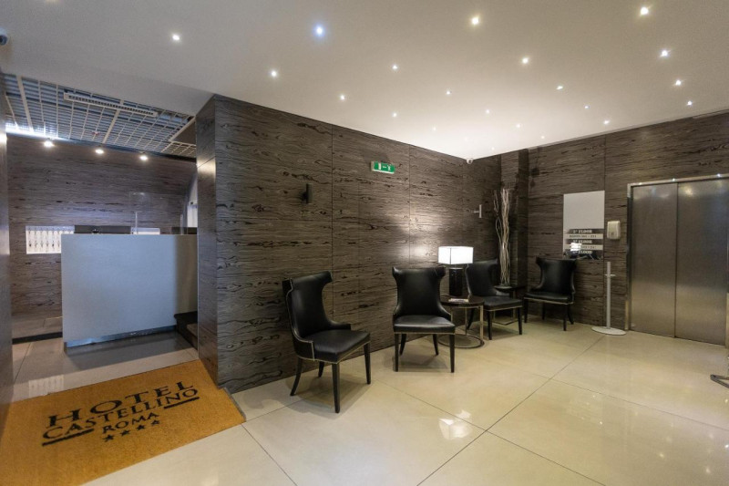 The spacious step-free seating area has high-back leather seats and a small round table. There is also an elevator.