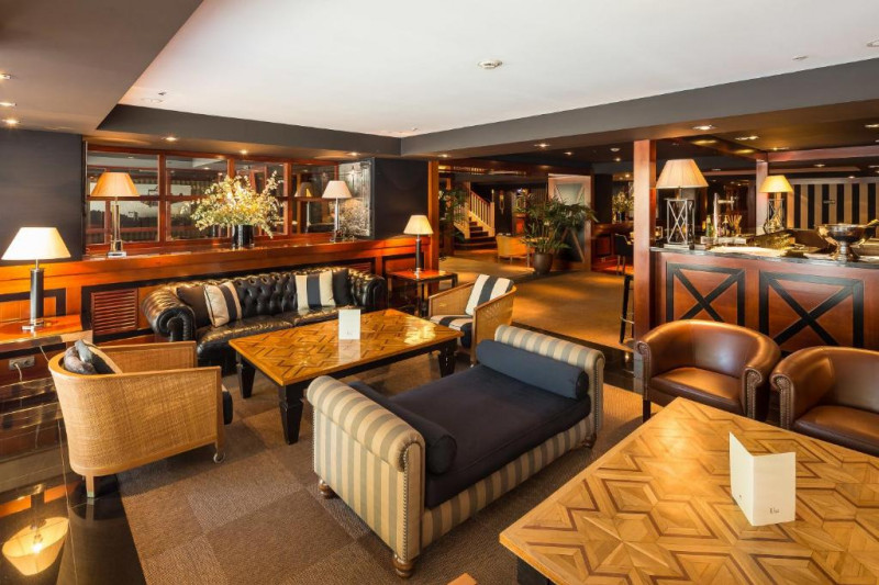 The spacious, step-free seating area has assorted sofas, armchairs and tables.
