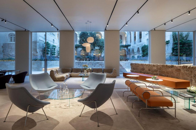 The spacious, step-free seating area has assorted sofas and movable chairs.