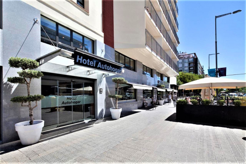 Access to the hotel is through 2 glass, sliding doors from the step-free sidewalk.