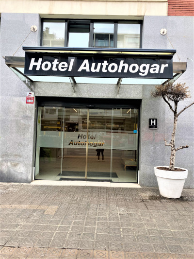 Access to the hotel is through 2 glass, sliding doors from the step-free sidewalk.
