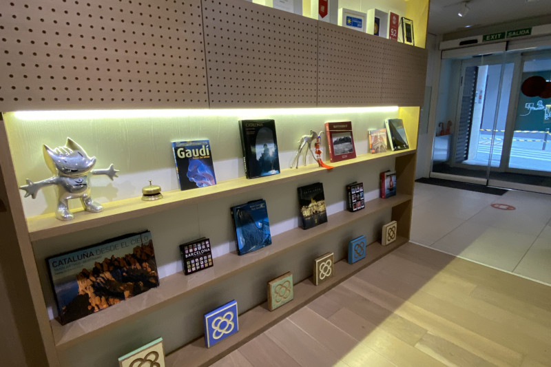 The lobby is spacious and step-free with a large bookcase along one wall.