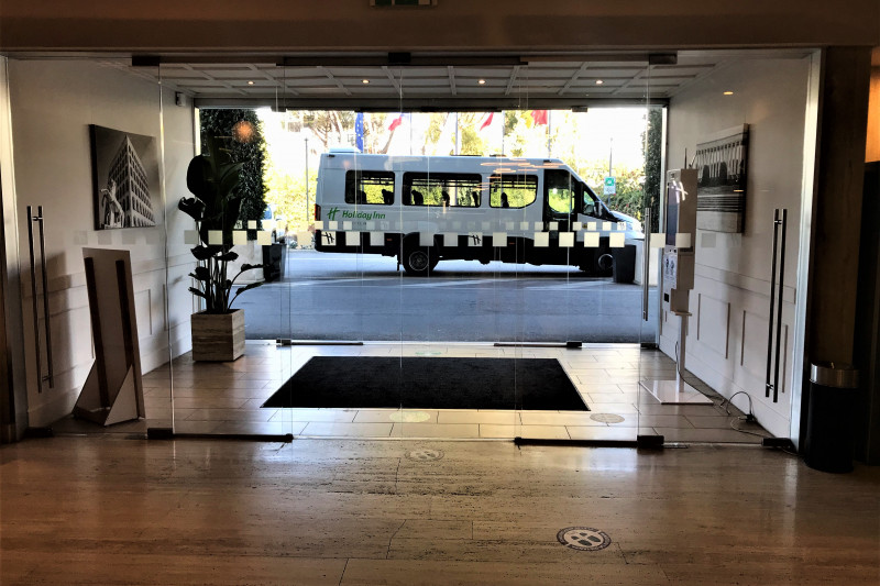 Access to the hotel is through 2 sets of automatic, sliding, glass doors. There is a doormat between the doors. The area is step-free.