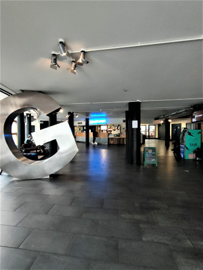 The spacious, step-free lobby has a large sculpture. There is also an ATM cash machine.