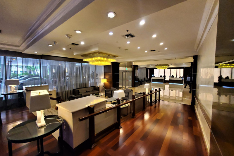 There is a small ramp with a handrail leading down to the spacious reception area.