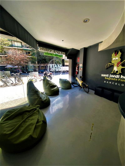 The spacious lobby has 4 bean bags and 3 pouffes.