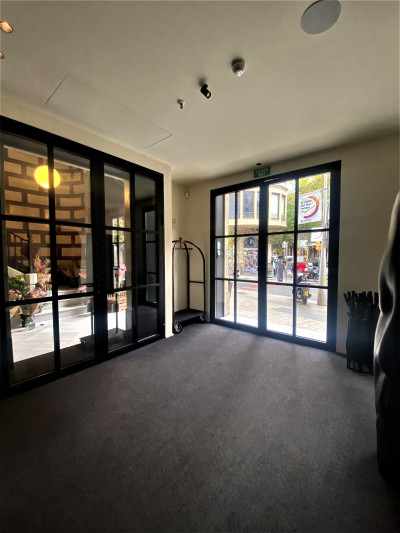 The lobby area is spacious and step-free. There is a luggage trolley