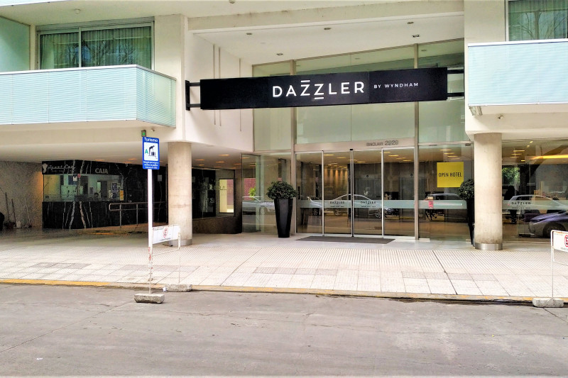 Access to the hotel is through sliding, glass doors from the sidewalk.