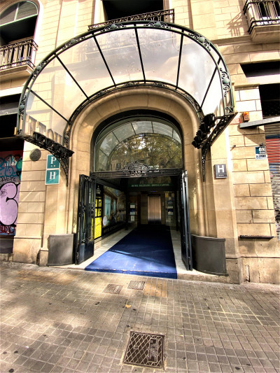 Access to the hotel is from the sidewalk. There is a small step leading to the hotel entrance.