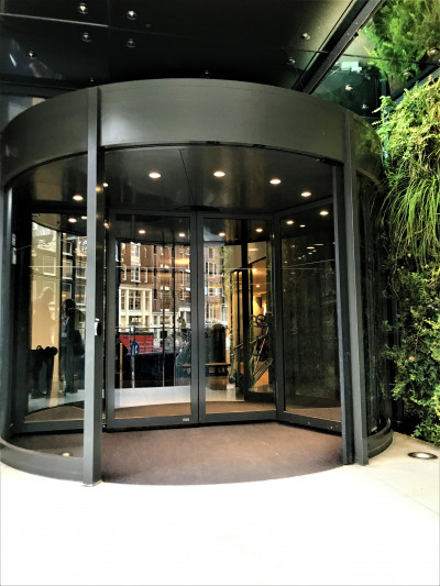 Access to the hotel is through 2 sets of automatic glass doors.