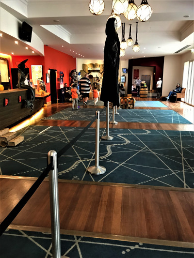 The spacious, step-free reception area has queue barriers.