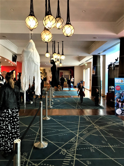 The spacious, step-free reception area has queue barriers.