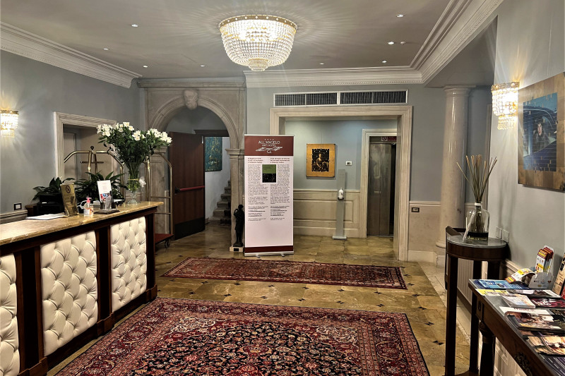 The spacious reception area has a high check-in desk.