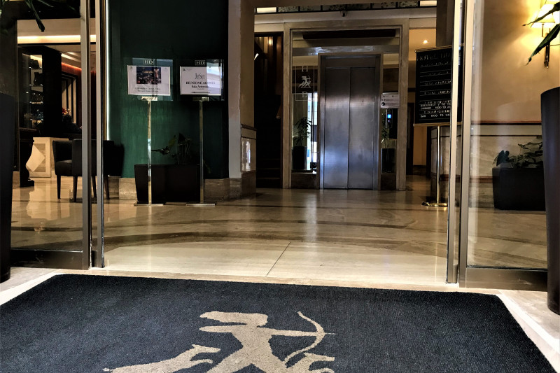 Access to the hotel is through automatic sliding doors. The lobby has an elevator with accessible call buttons.