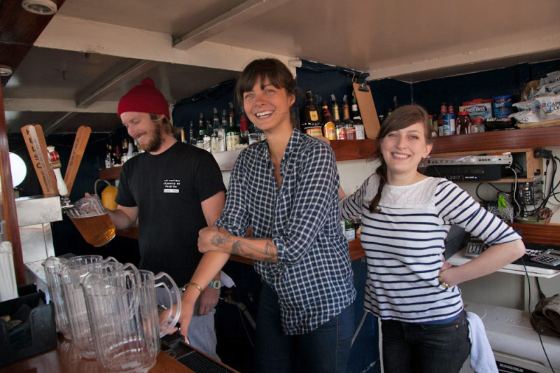 Bartenders prepare drinks for visitors on the Boat Tour