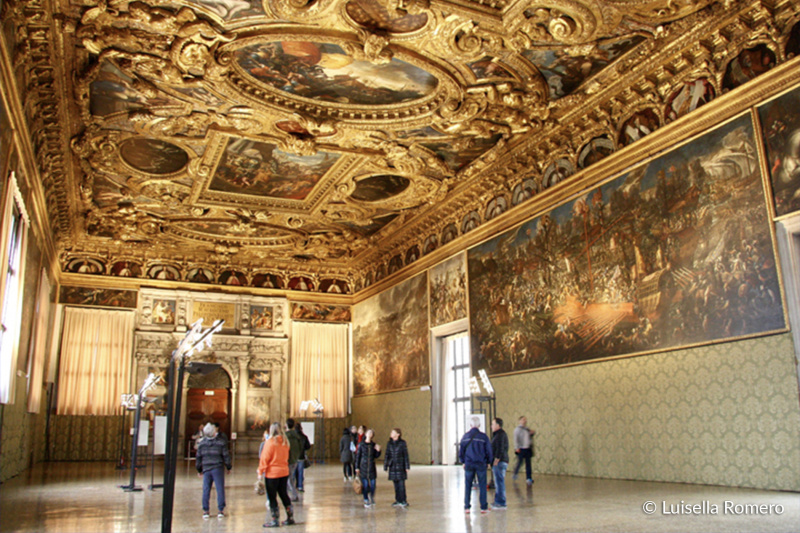 The Interior of Doge's palace has smooth flooring and large Venetian gothic style paintings