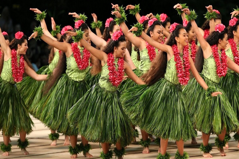 A Polynesian dance with traditional clothing.
