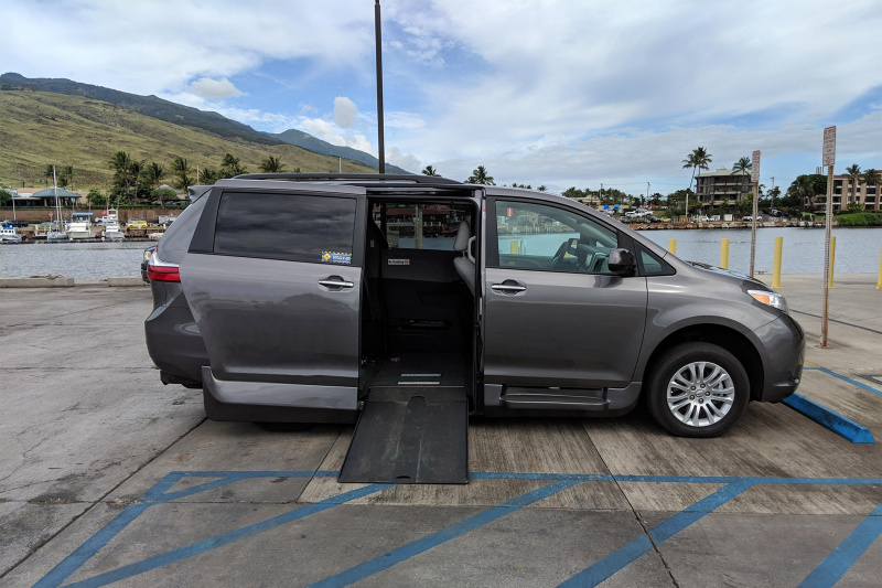 The wheelchair accessible van overview with the ramp on the side.